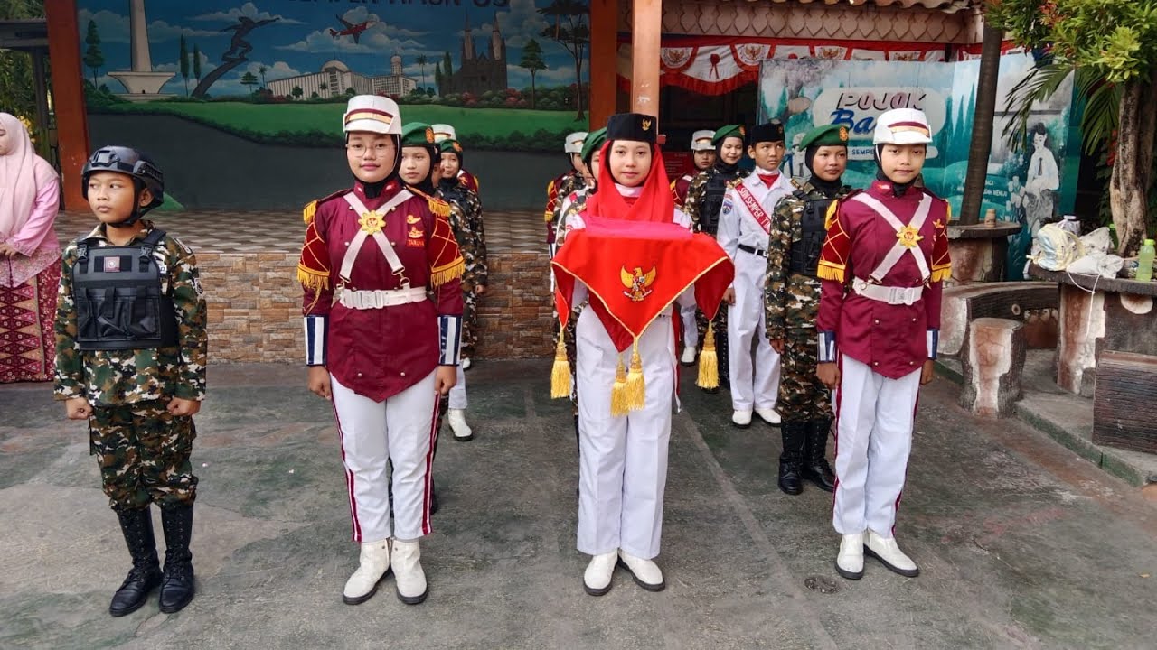 PENGIBARAN BENDERA MERAH PUTIH HUT RI KE-80