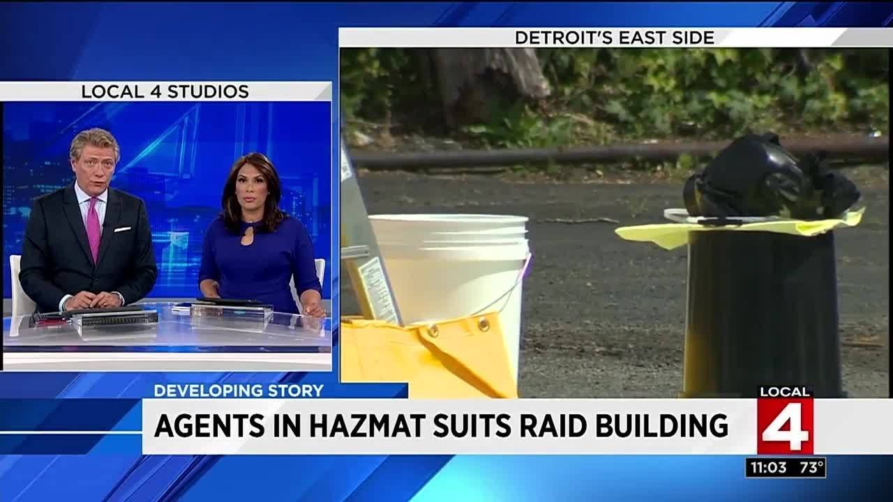 Agents in hazmat suits raid building on Detroit's east side