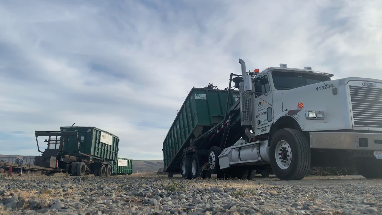 Rural Roll-off Action w/ truck and pup