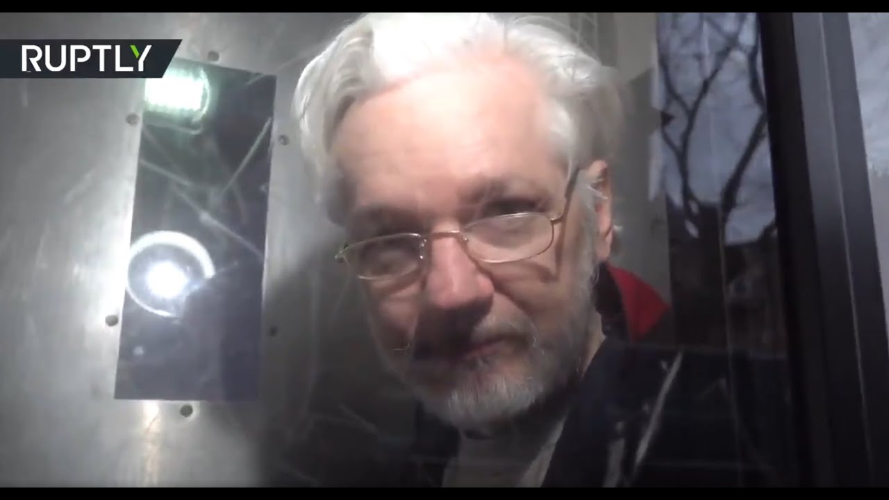 Julian Assange filmed being transported from Westminster Magistrates Court following hearing
