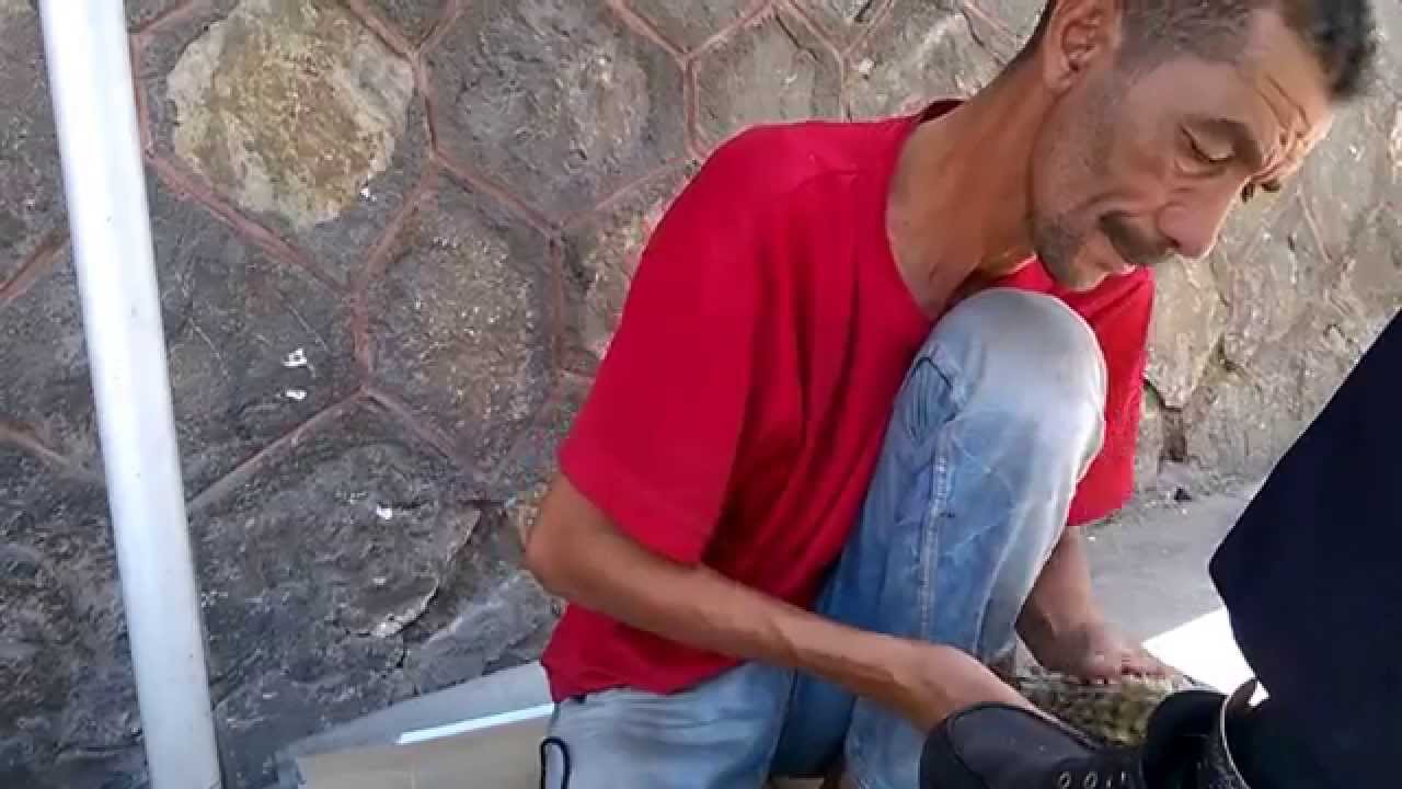 Getting my shoes done in Marrakech, Morocco.