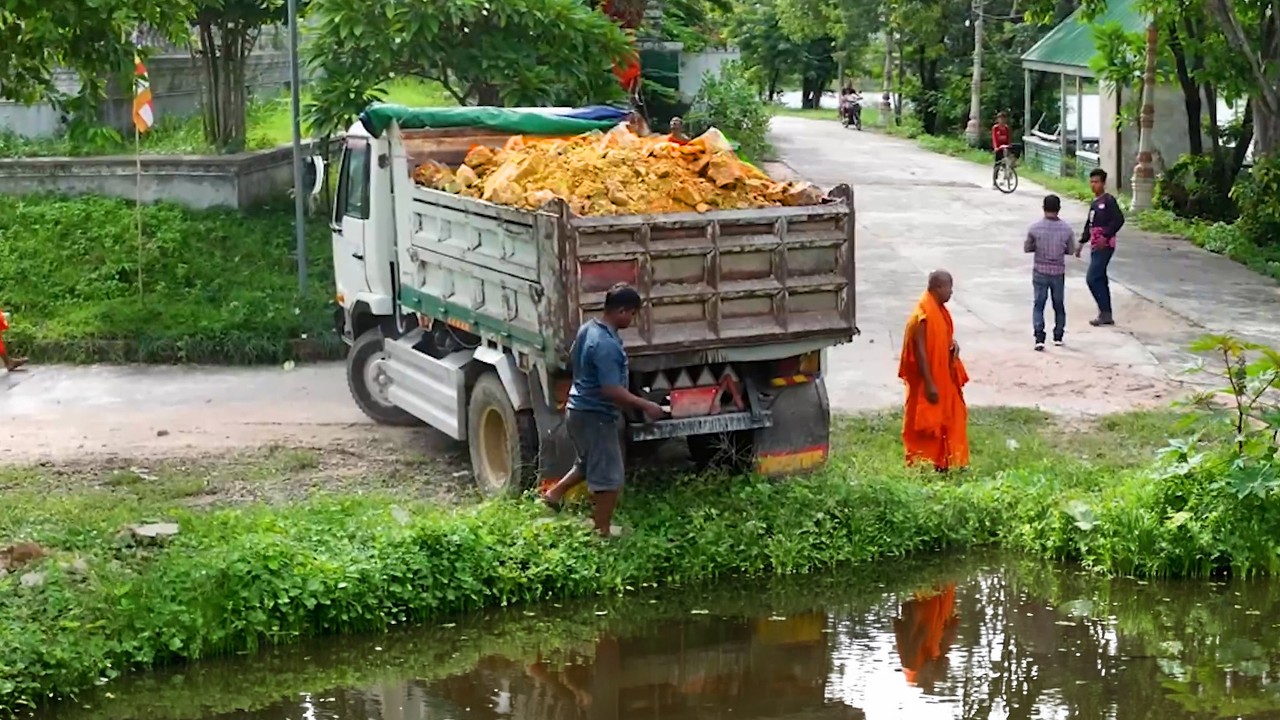 wonderful landfill delete pond full project ! truck transport soil ,bulldozer push soil in pagoda
