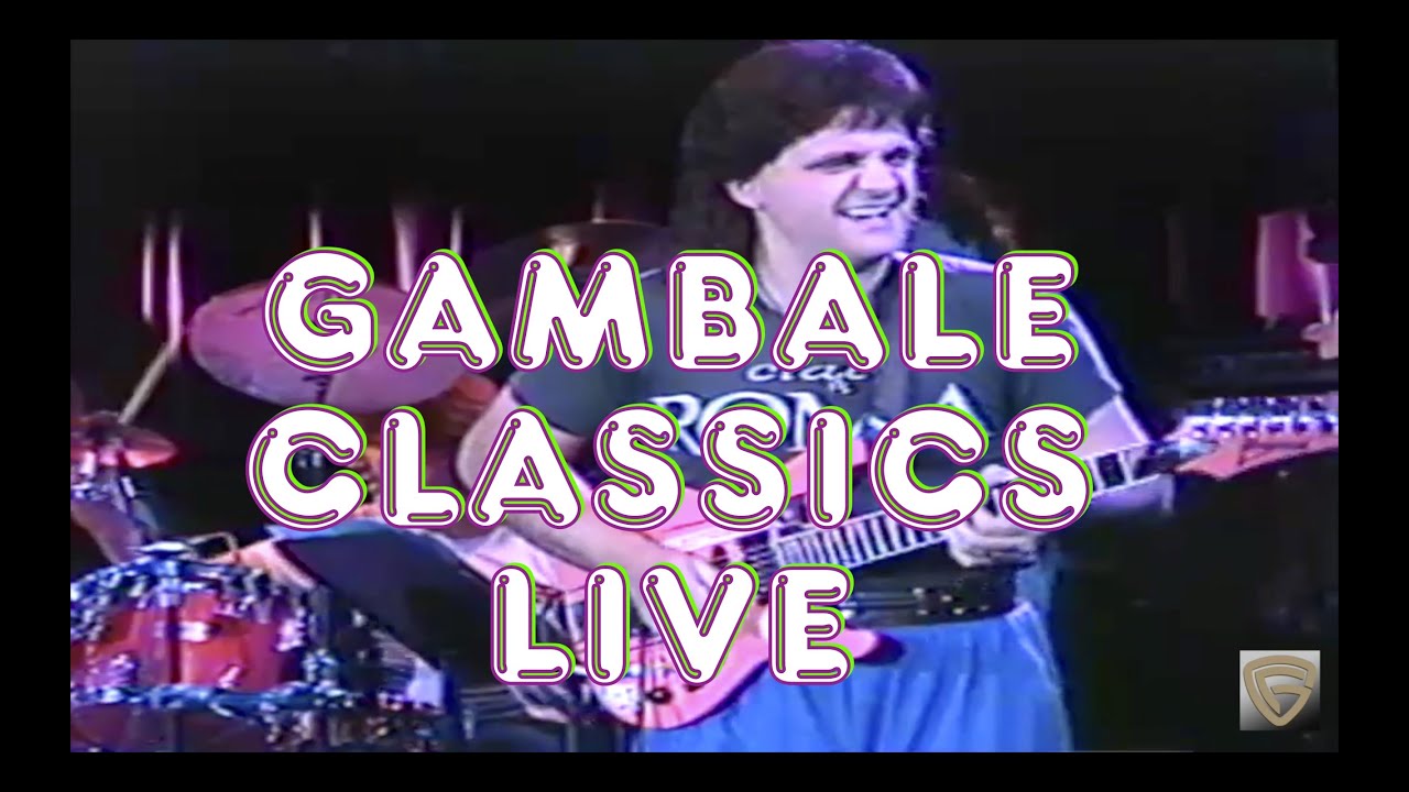 FRANK GAMBALE GROUP LIVE1991. GUITARIST GAMBALE PERFORMS SOME OF HIS EARLY CLASSICS.