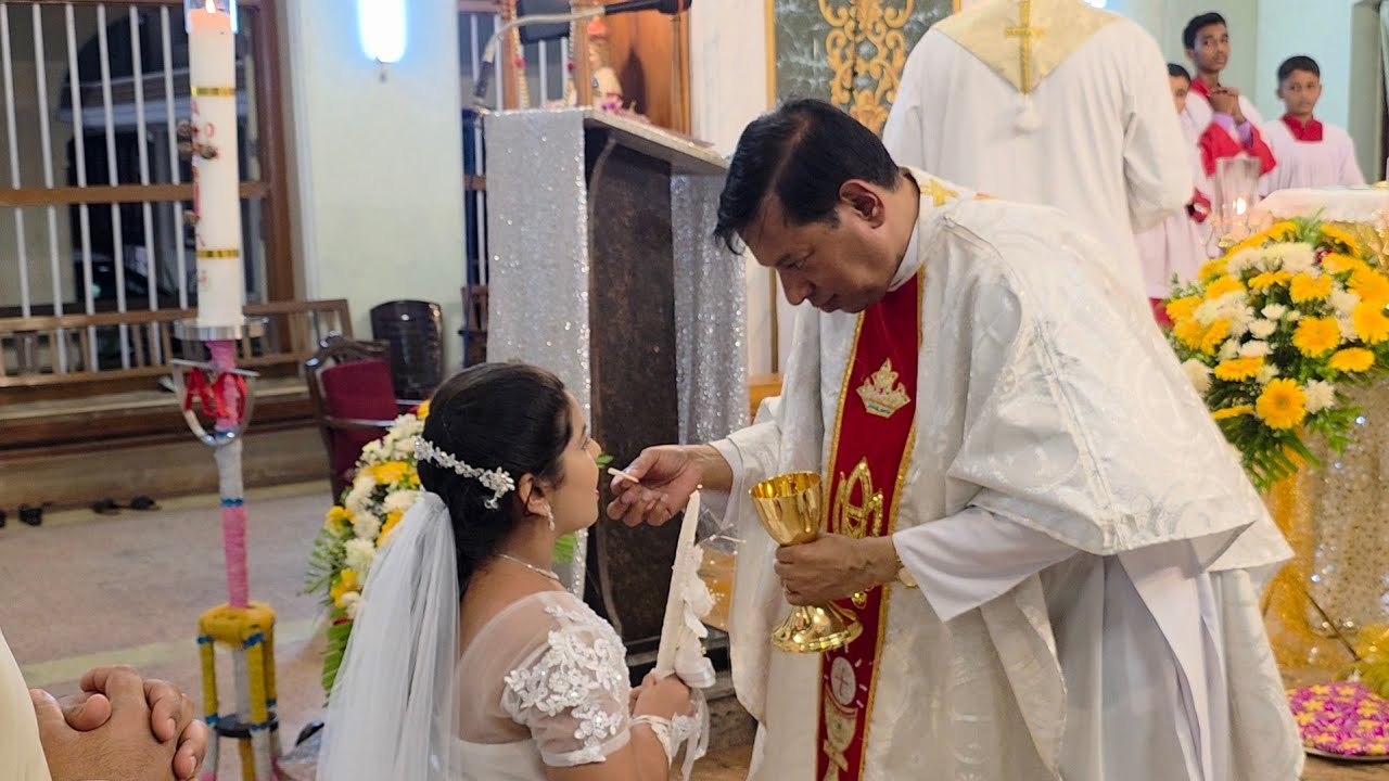 First Holy Communion of Caira Preemal Dsouza d/o Colin/Prafulla, Holy Family ward, Agrar Bantwal