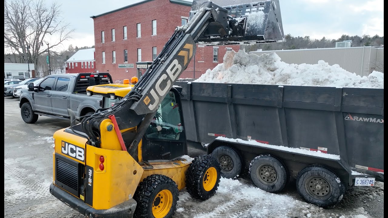 Snow removal with skid steer and big dump trailer