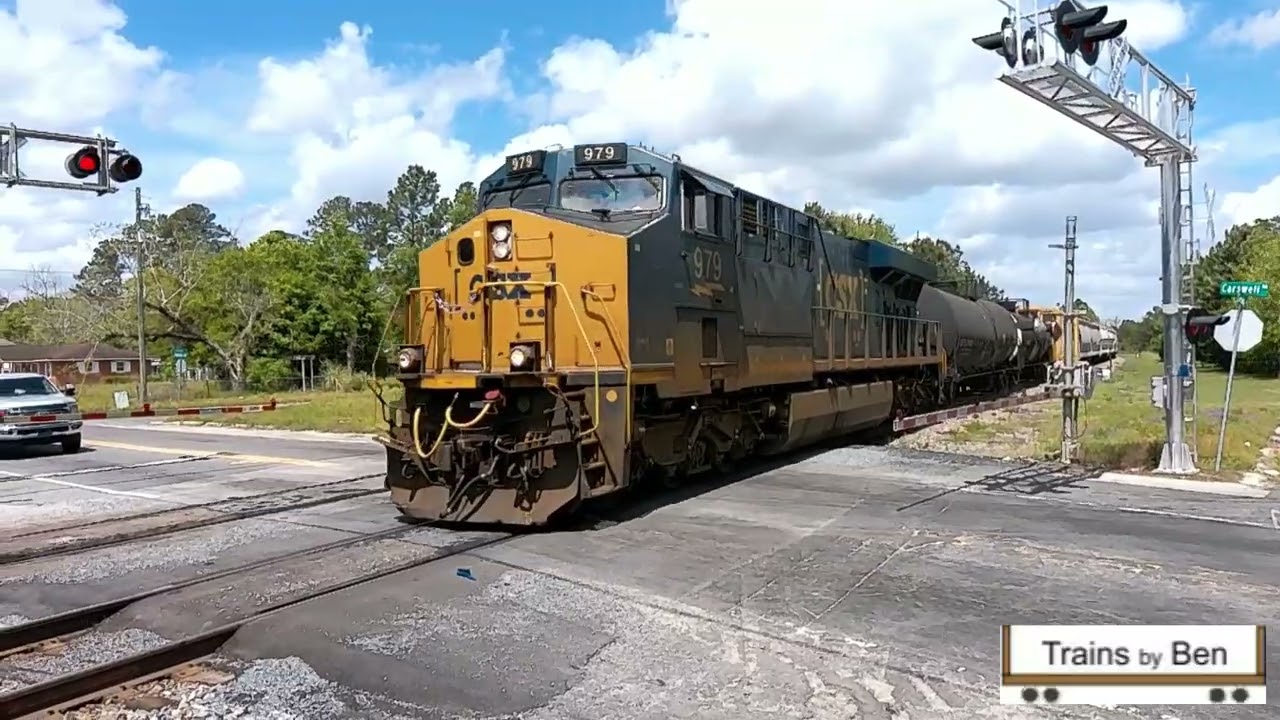 CSX 979 Waits While Three Pass