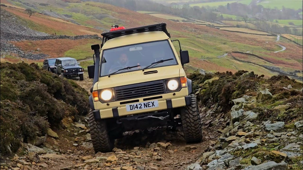 Off Road in a Storm, 4x4 breaks on the trail.