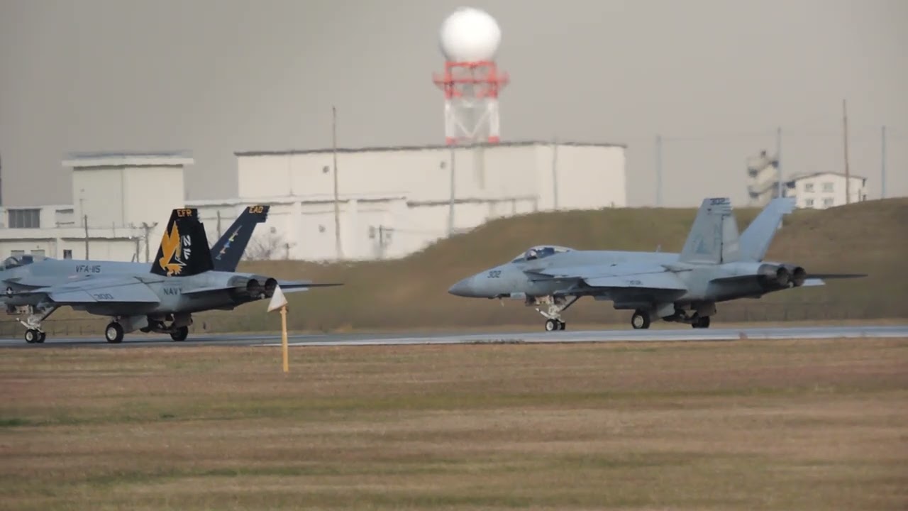 Take off of 2 US Navy VFA-115 Eagles F/A-18E's