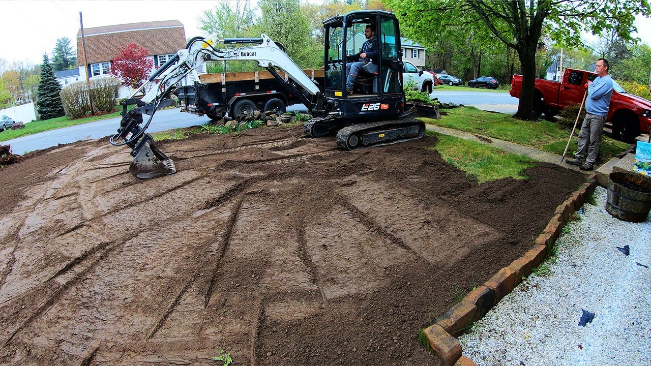 Spreading Loam for a New Lawn