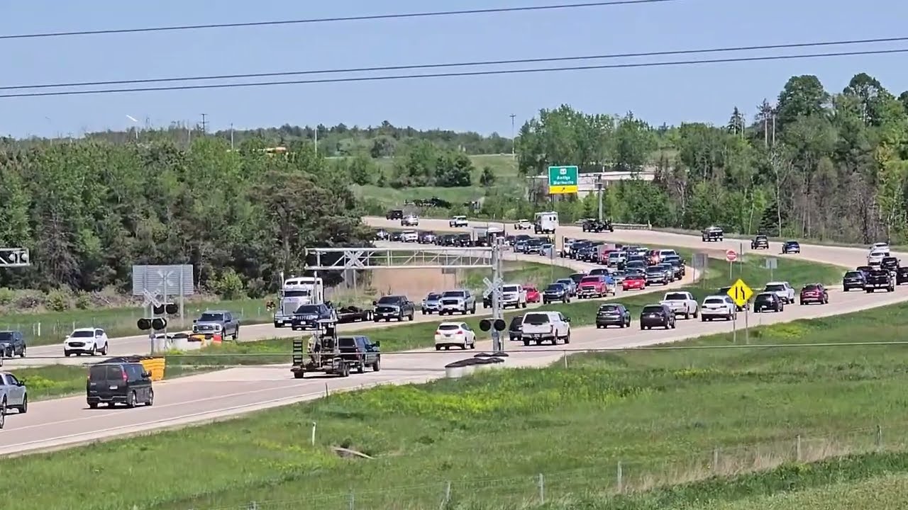 This 5mph Freight Train BLOCKS A Major Highway On A Sunday Afternoon! #trains #trainhorn