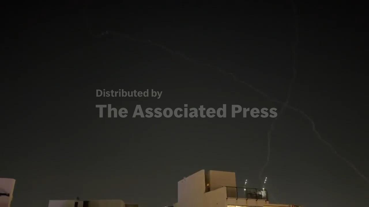 Air raid sirens sound and interceptions seen across Tel Aviv