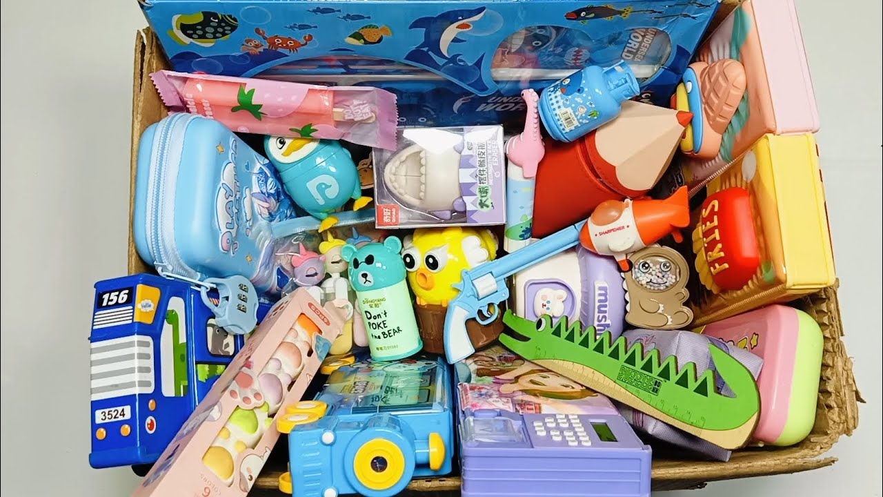 Box full of Trending stationery items, lock pencil pouch, geometry box, eraser sharpener, pen, scale