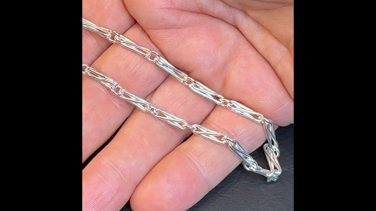 Making a silver chain.