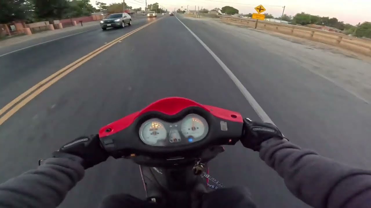 A SCOOTER RIDE OUT IN THE COUNTRY 