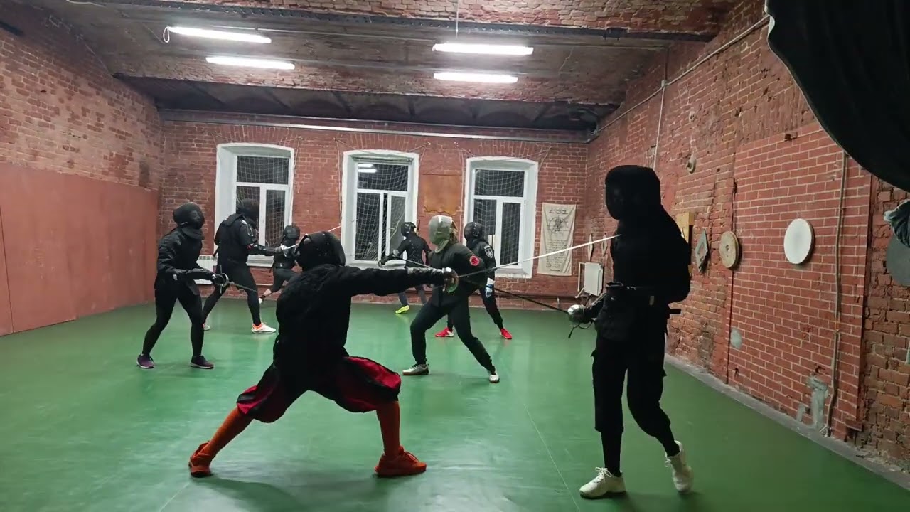 Brazilian and Russian rapierists sparring with a Kvetun rapier