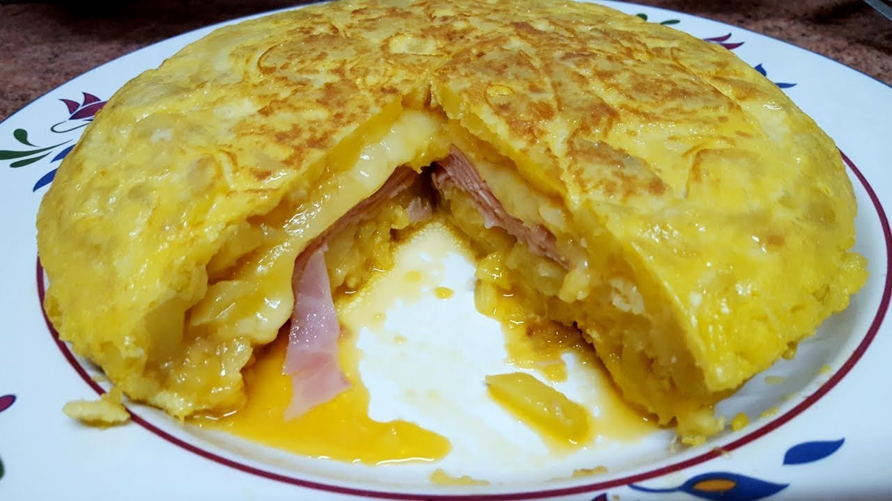 Tortilla de patata rellena de jamón y queso, la mas fácil y mas rica