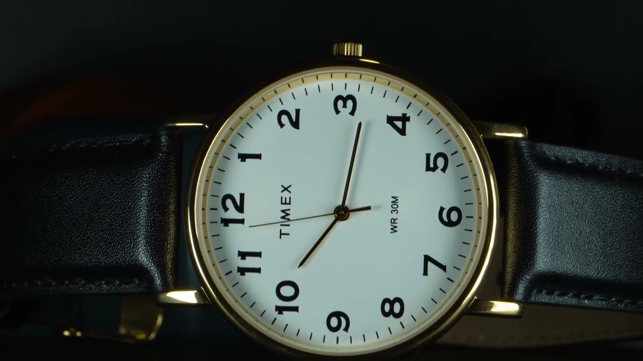 Timex golden colour white dial with full numeric figure analog men's watch.@TimexGroupIndia