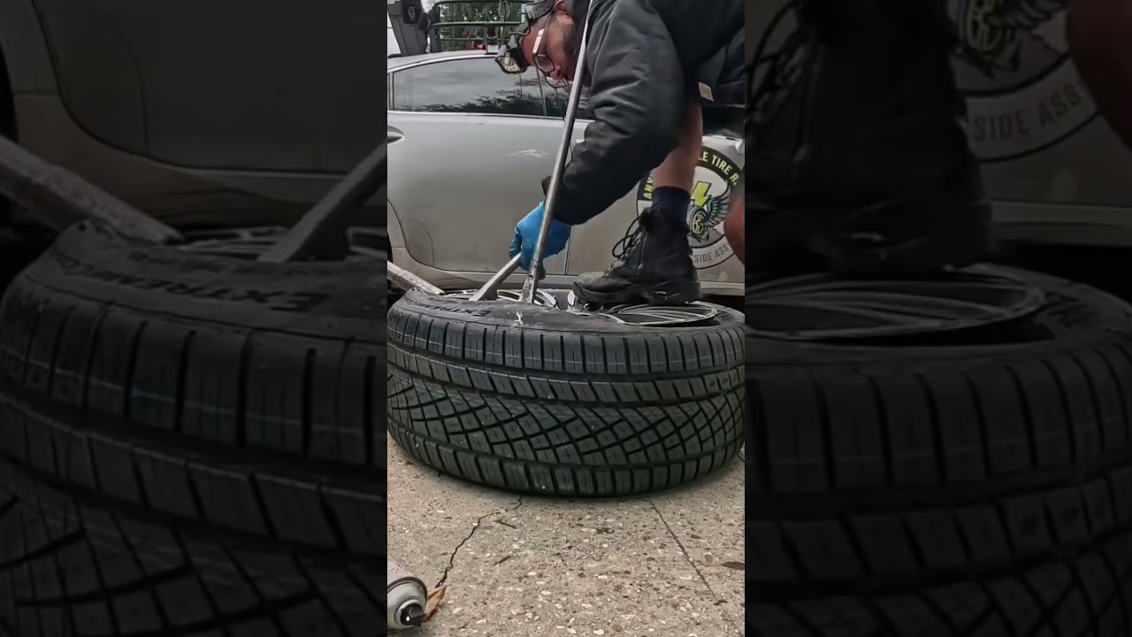 Changing a tire with irons.   