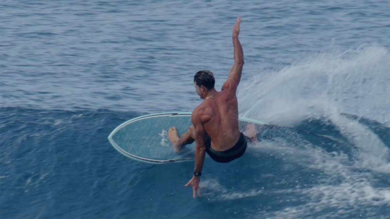 Lucas Godfrey rides a Gerry Lopez Twin Fin Fish in Hawaii.