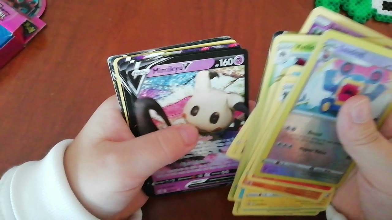 Abriendo 2 cajas de cartas de Pokemon y enseñando mi álbum