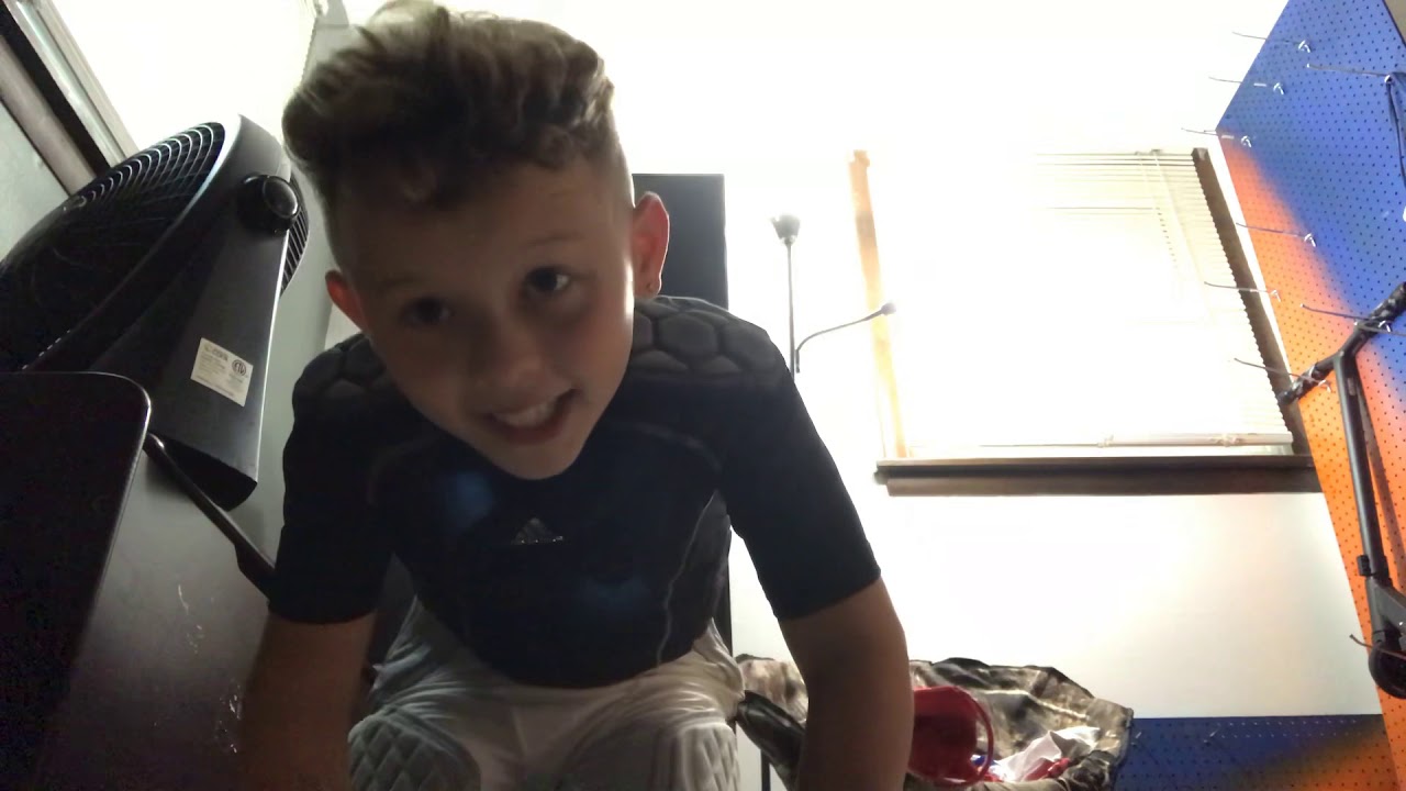 Putting on football gear