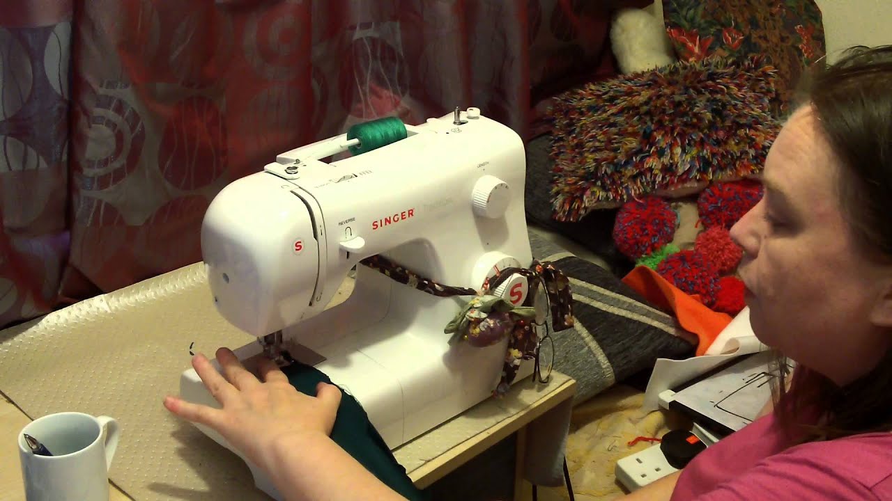 posh cloak, velvet Cloak sewn on a sewing machine