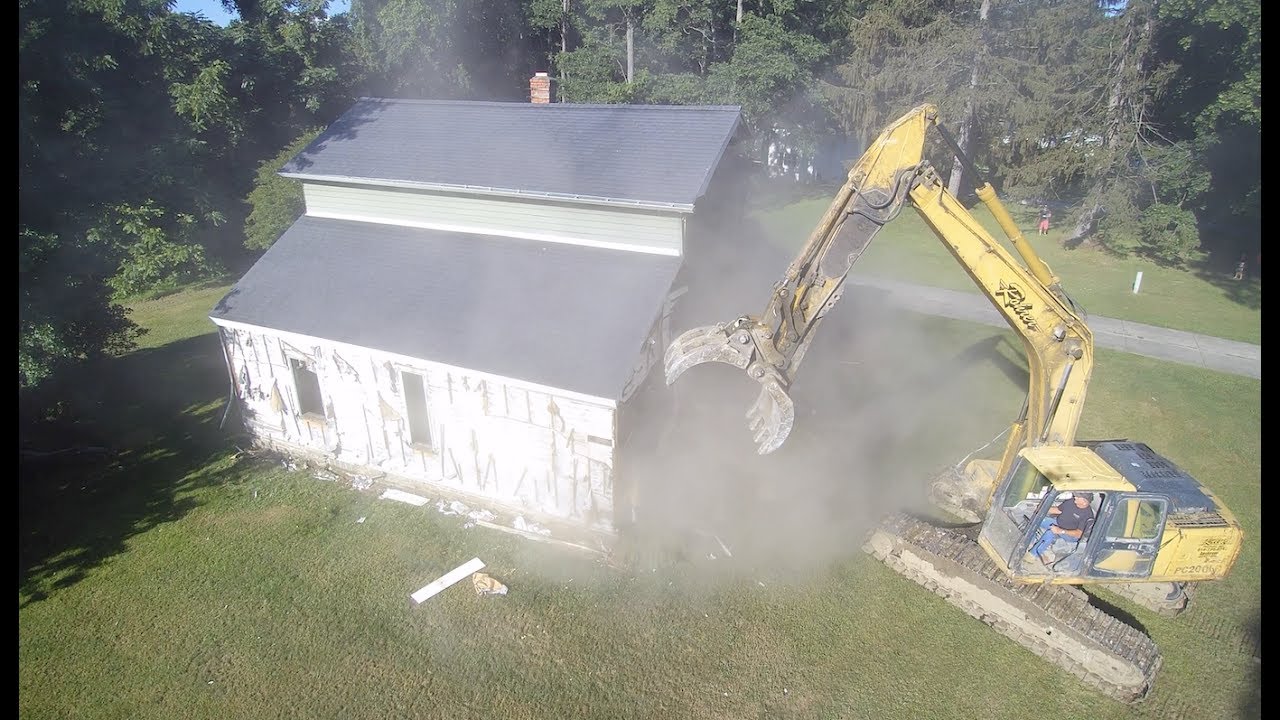 Heavy Equipment Excavator in Action 1840 House Demolition