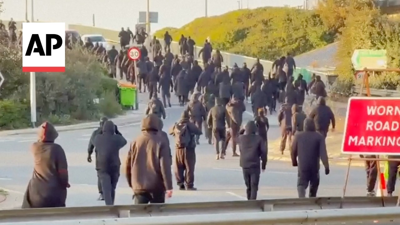 Masked anti-immigration protesters block roads leading to UK's Dover port