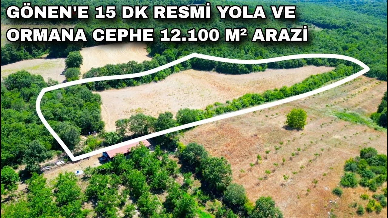 2313- FİYAT DÜŞTÜ !!! GÖNEN'E 15 DK RESMİ KADASTRO YOLA VE ORMANA CEPHE 12.100 M² TARLA