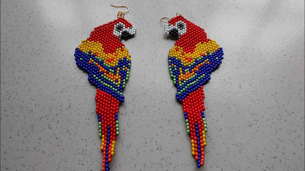 parte 1/1 aretes guacamayo hechas sin telar