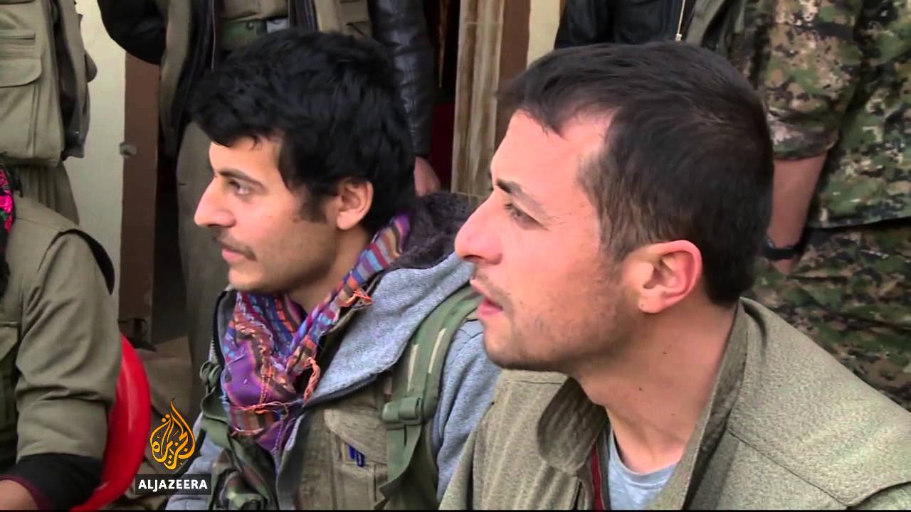 Syrian and Iraqi Kurds battle ISIL in Sinjar