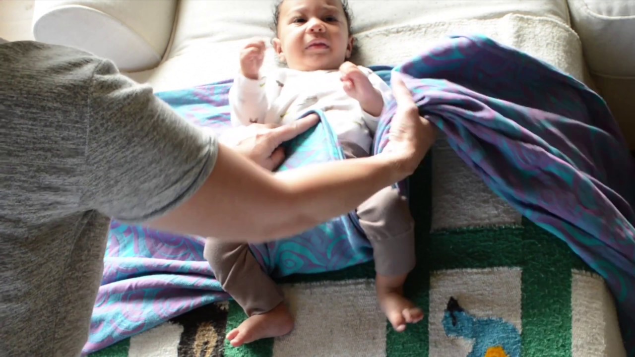 Rucksack with a Newborn using a long woven wrap