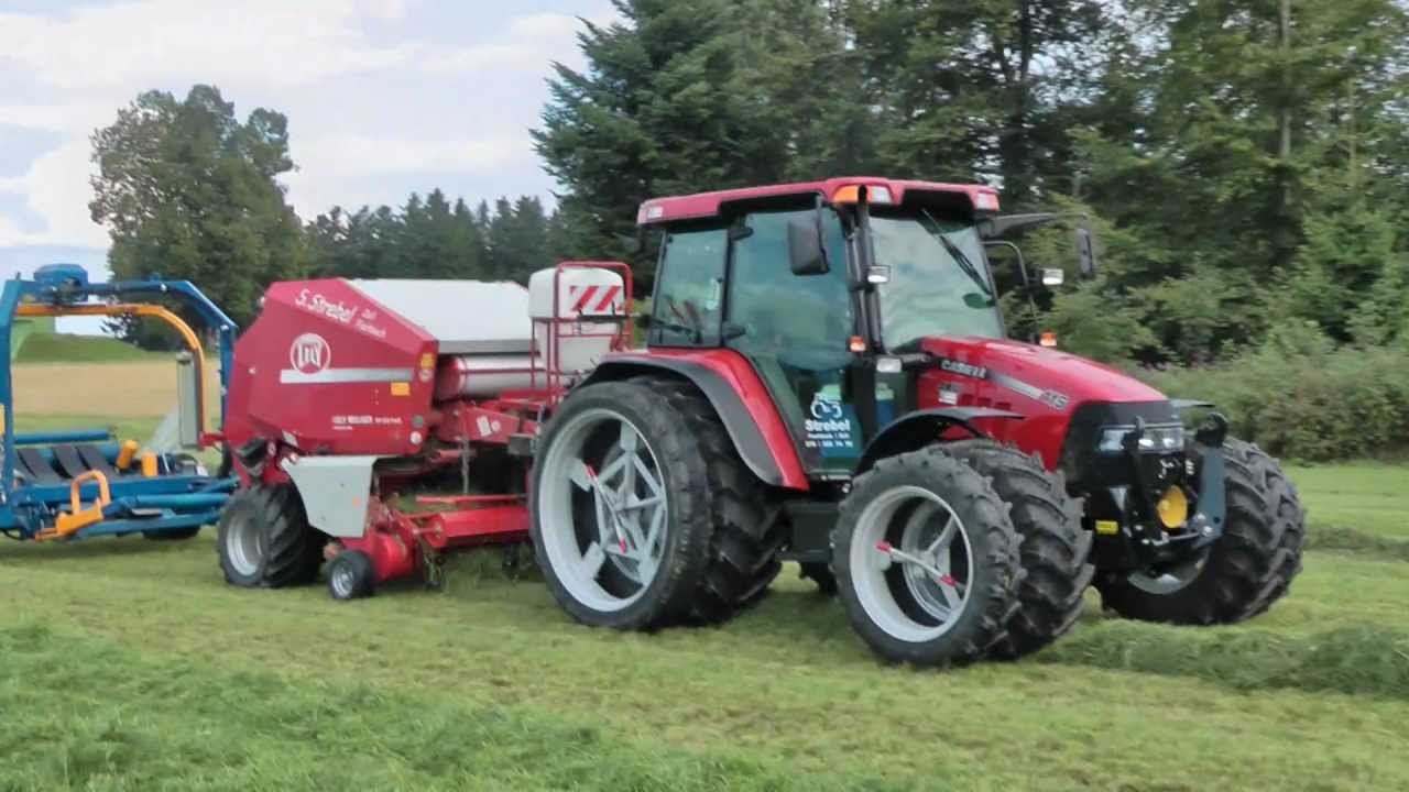 Rundballenpressen mit Case JXU Welger 235 Göweil 5020 Inline
