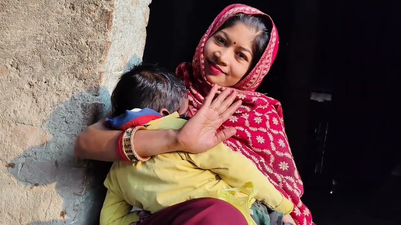 Baby feeding mother milk bihar village India 