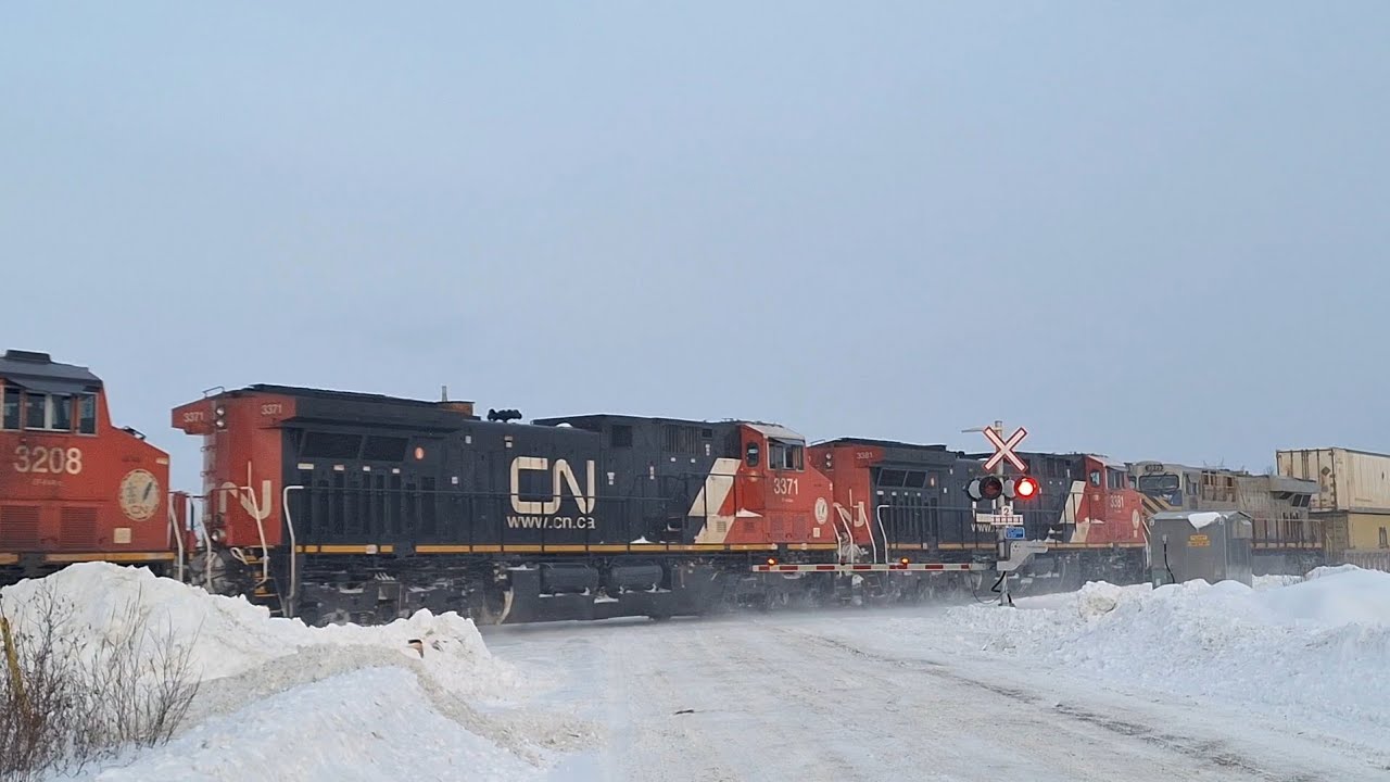 A DOUBLE STACK TRAIN WITH A SURPRISE 5 ENGINE LASHUP ON THE FRONT!