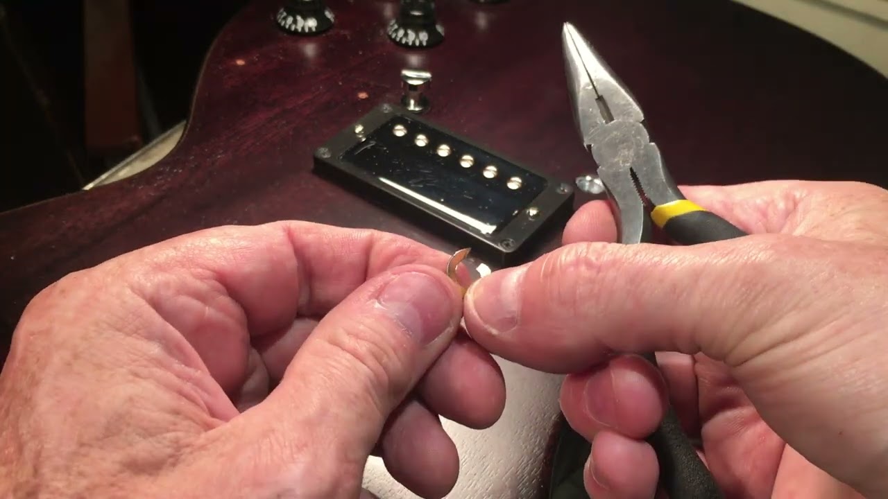 How to stop Gibson style tailpieces from tilting