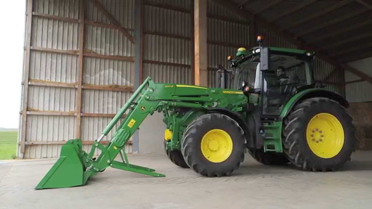 Ładowacze John Deere serii R - automatyczna blokada wspornika