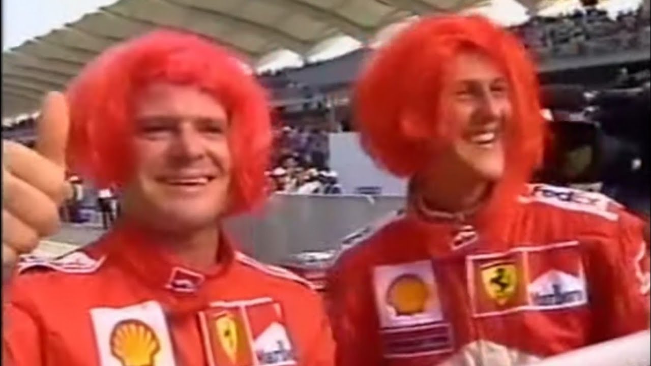 Ferrari don red wigs at Malaysia, 2000
