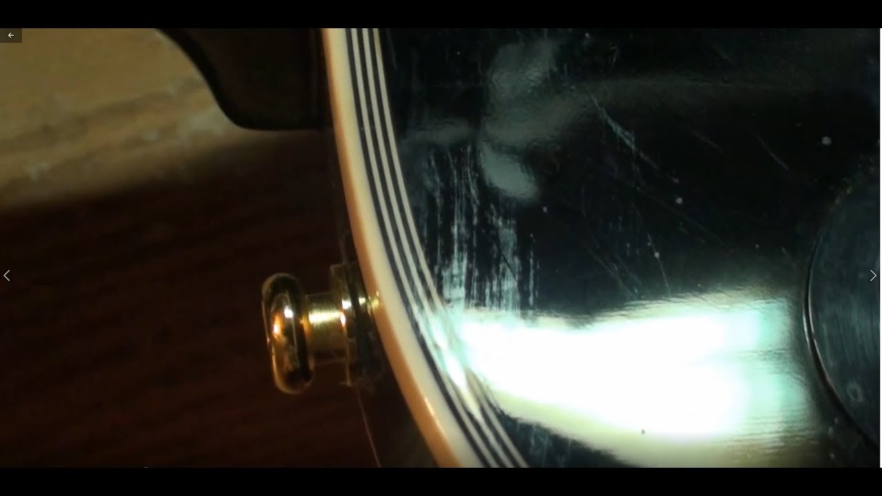how to remove scratches from guitar finish by Randy Schartiger