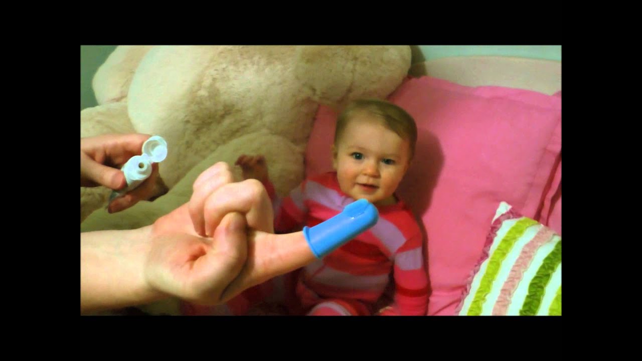 Brushing a baby's teeth