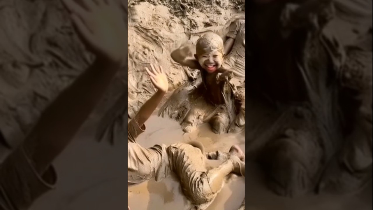 Children play in mud look so happy