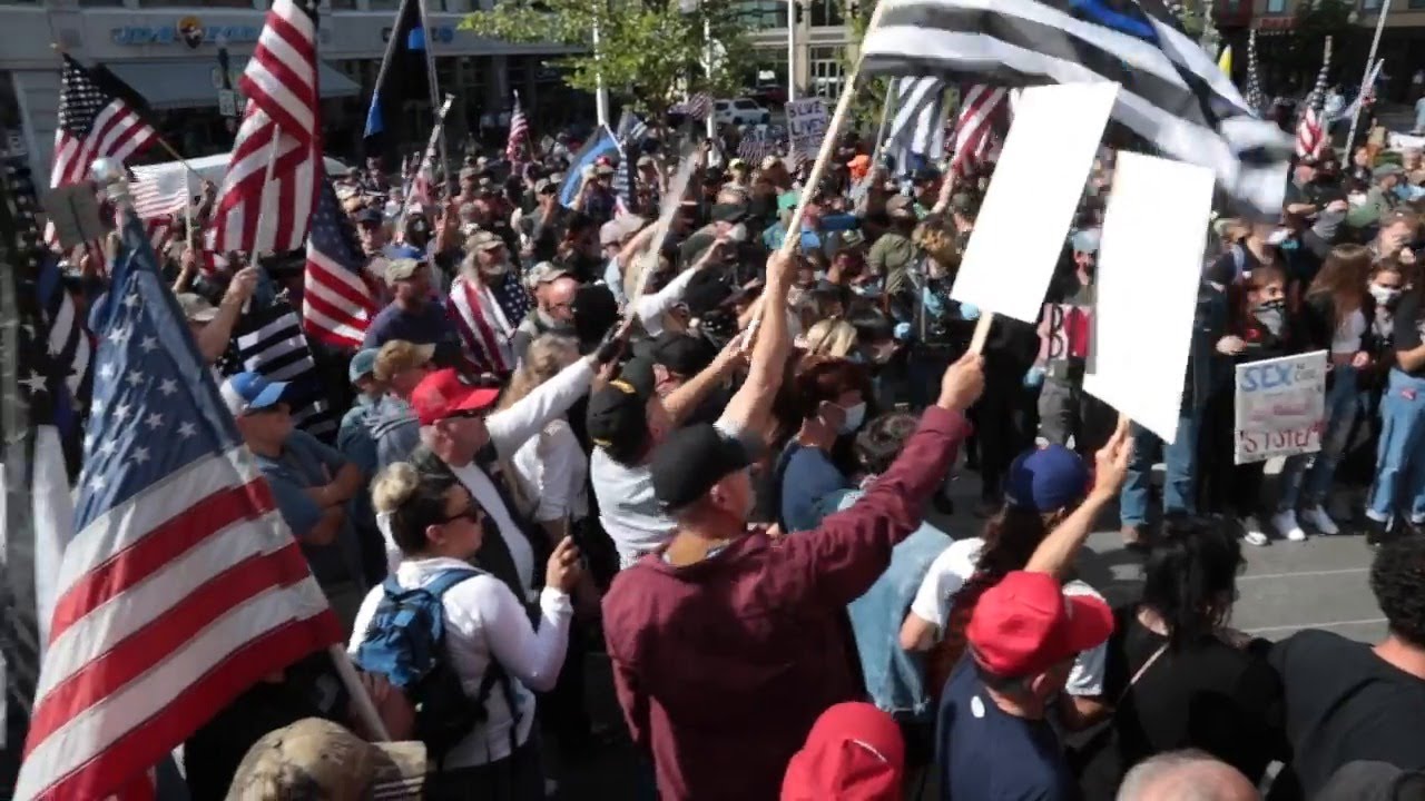 Hundreds of protesters and counterprotesters clash at Boise City Hall with police in the middle