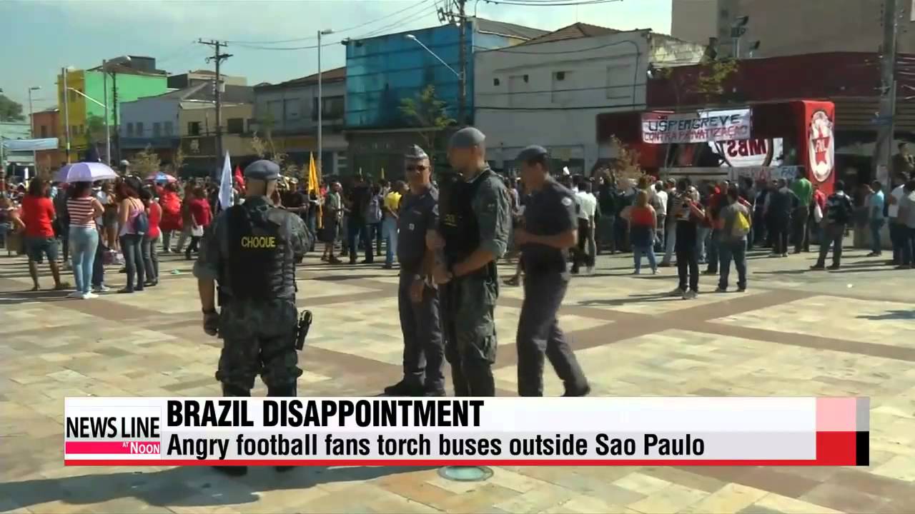 Angry football fans in Brazil torch buses