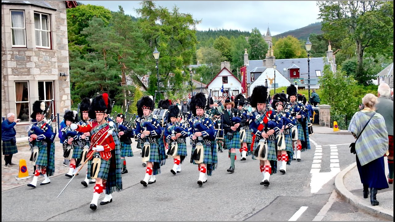 Pipe Band leads morning march Braemar Royal Highland Society to 2025 Braemar Gathering in Scotland