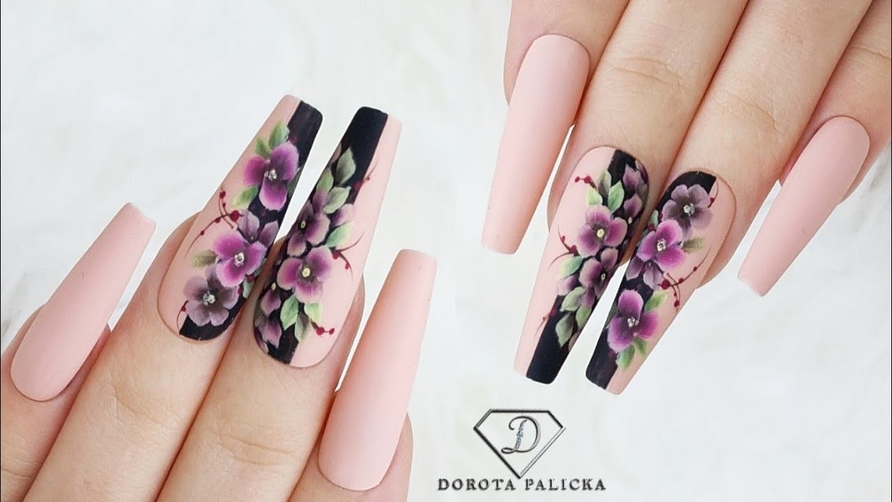 Autumn nail art with one stroke flowers using acrylic paints.