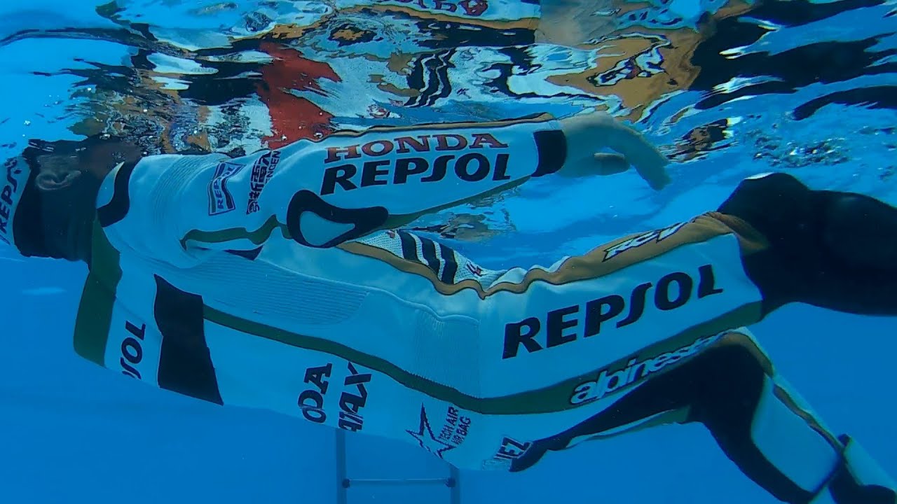 With Marc Marquez Honda Repsol Bikesuit in the Pool