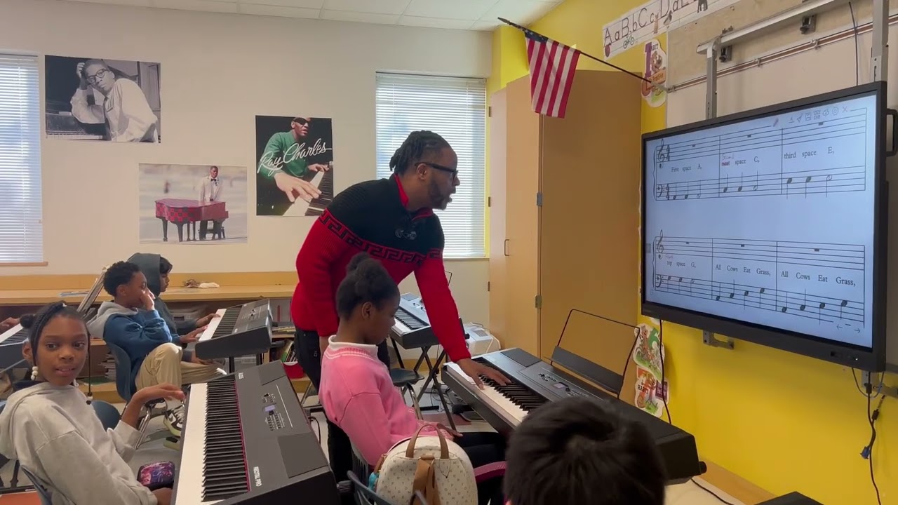 Playing the notes in the bass cleft lesson plan with Long Fellow Elementary 4th graders 