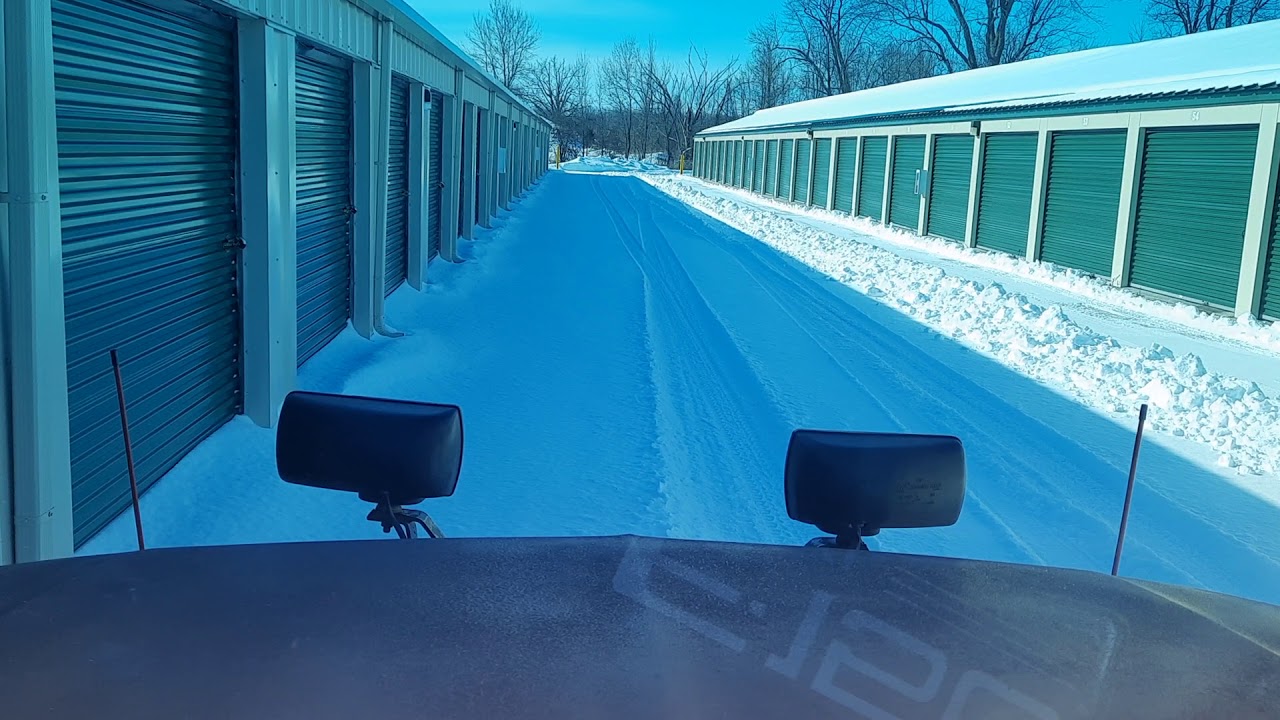 Crosby Self Storage . Plowing the snow.