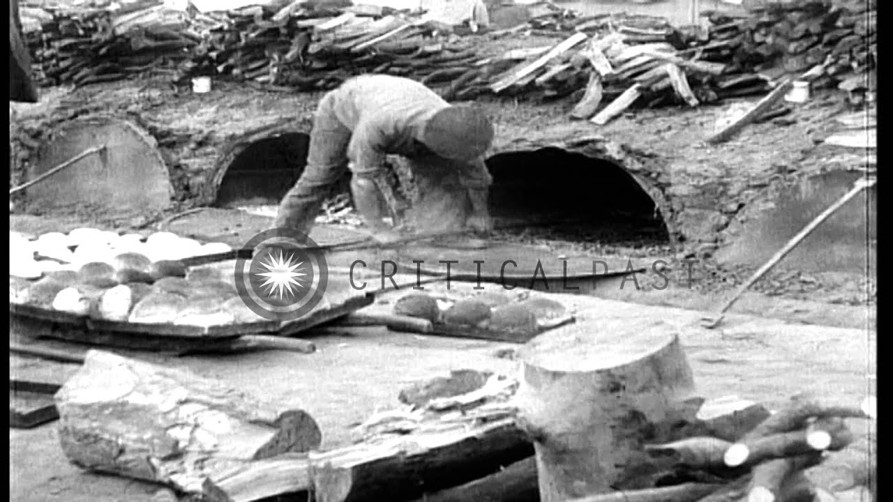 British troops bake bread at their camp in Salonika, Greece, during World War I HD Stock Footage