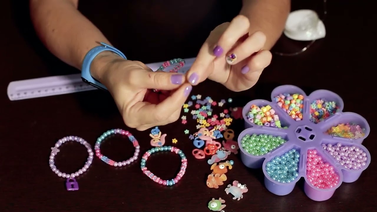 como fazer pulseiras de elastico com o kit margarida lilas com sereia